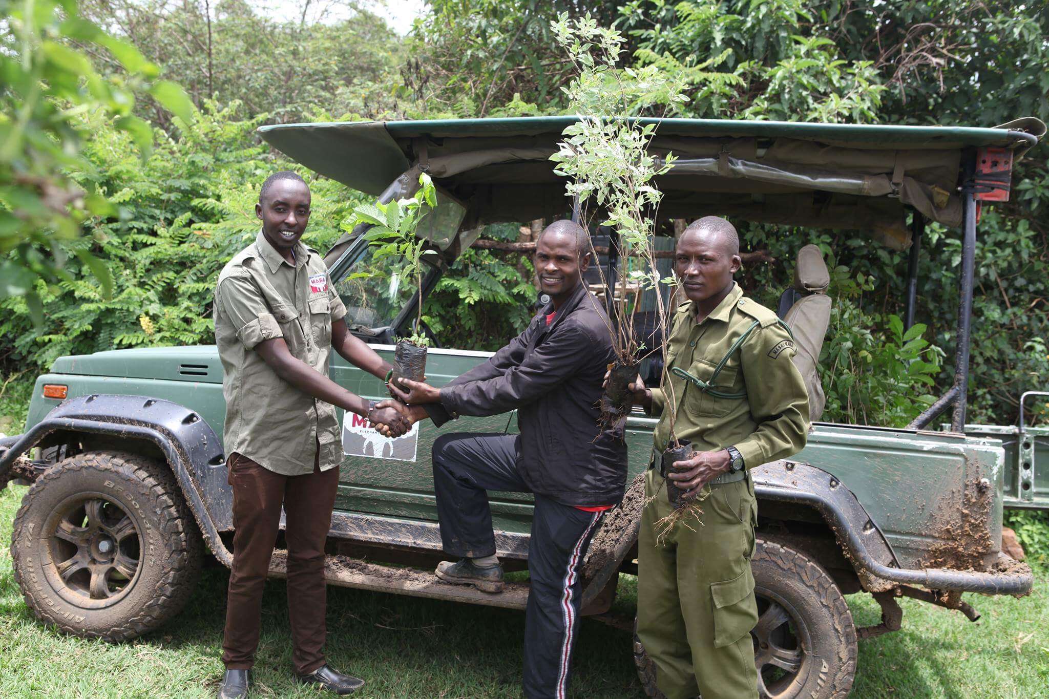 Wilson planting seeds at school